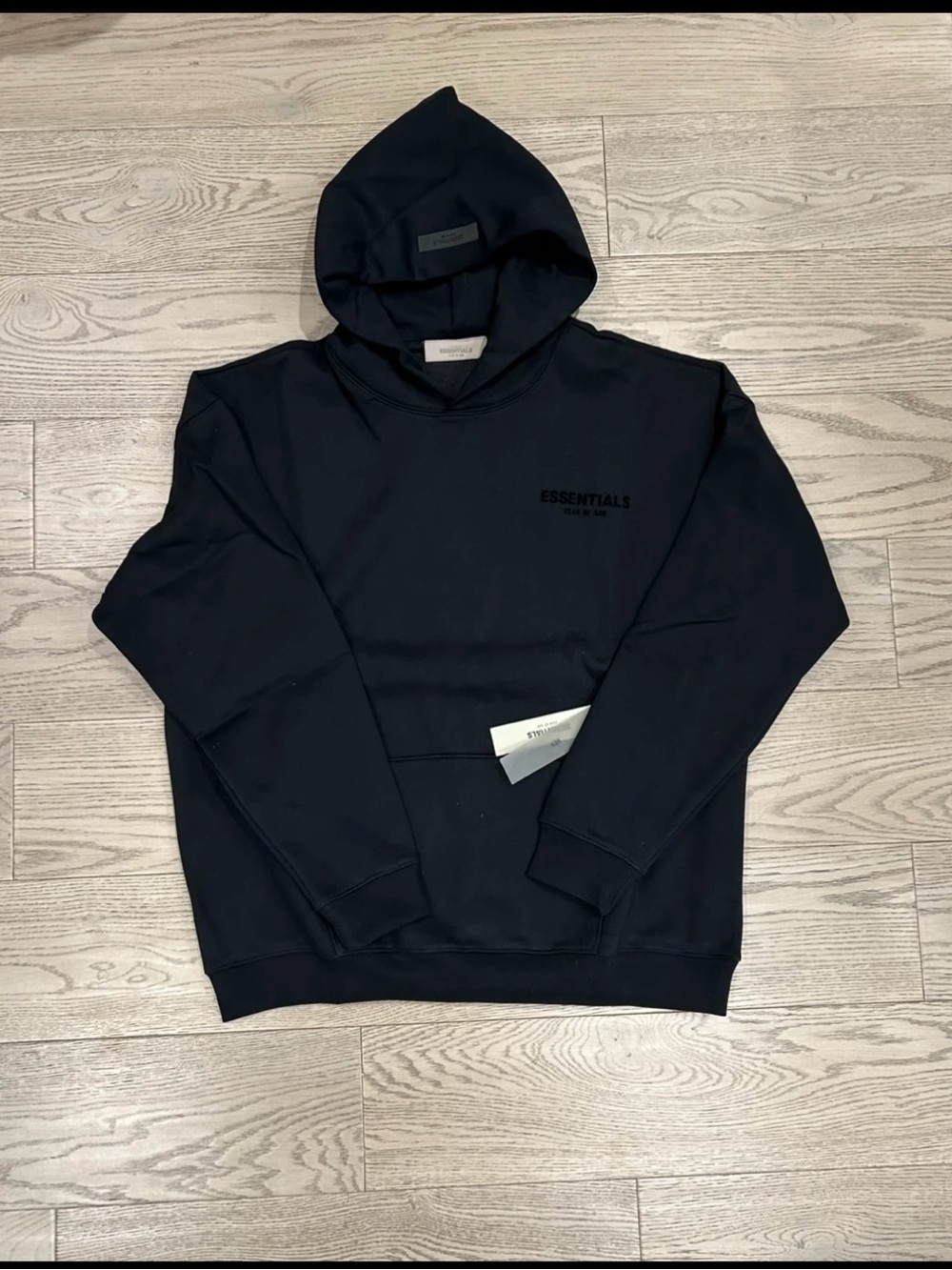 ESSENTIALS Men’s Black Hoodie with Minimal Logo